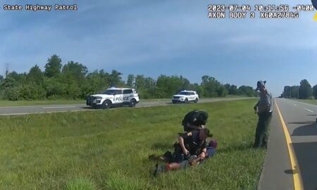 Unarmed Black Man Being Apprehended By Police After Being Bit By Police Dog
