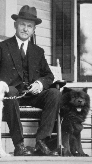 Calvin Coolidge Alongside Tiny Tim, One Of Two Chows That Resided At The White House During His Term.