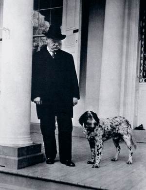 Grover Cleveland On The White House Steps Along With One Of Many First Dogs.